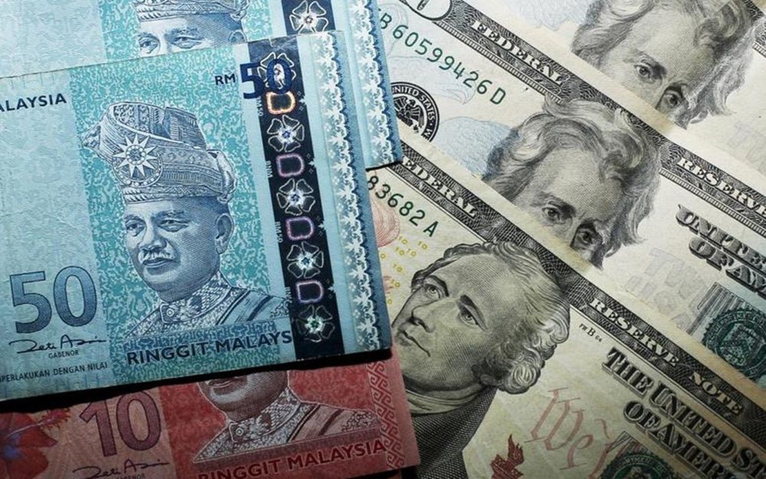 Ringgit flat vs US dollar, strengthens vs major currencies - Selangor ...